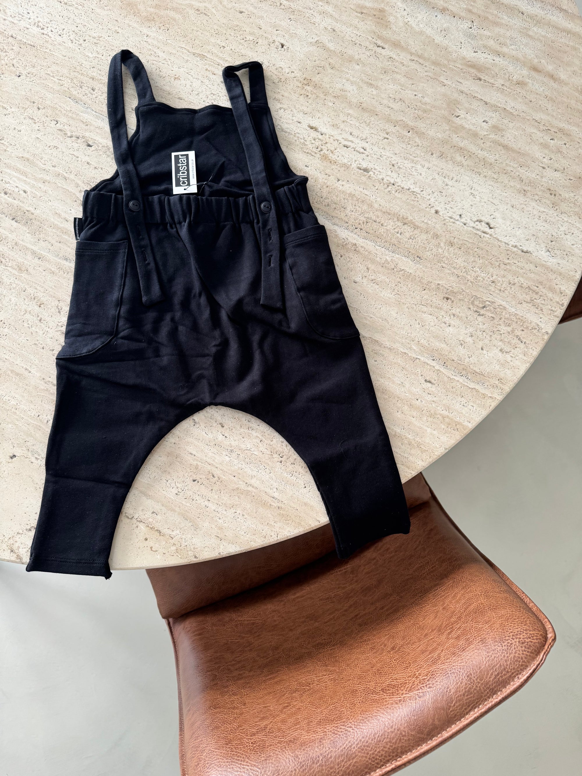 black overalls